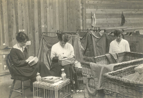 Women mending parcels